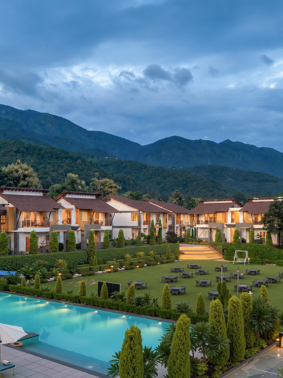 Private pool villa at Evara Spa & Resort with sun loungers and forest beyond